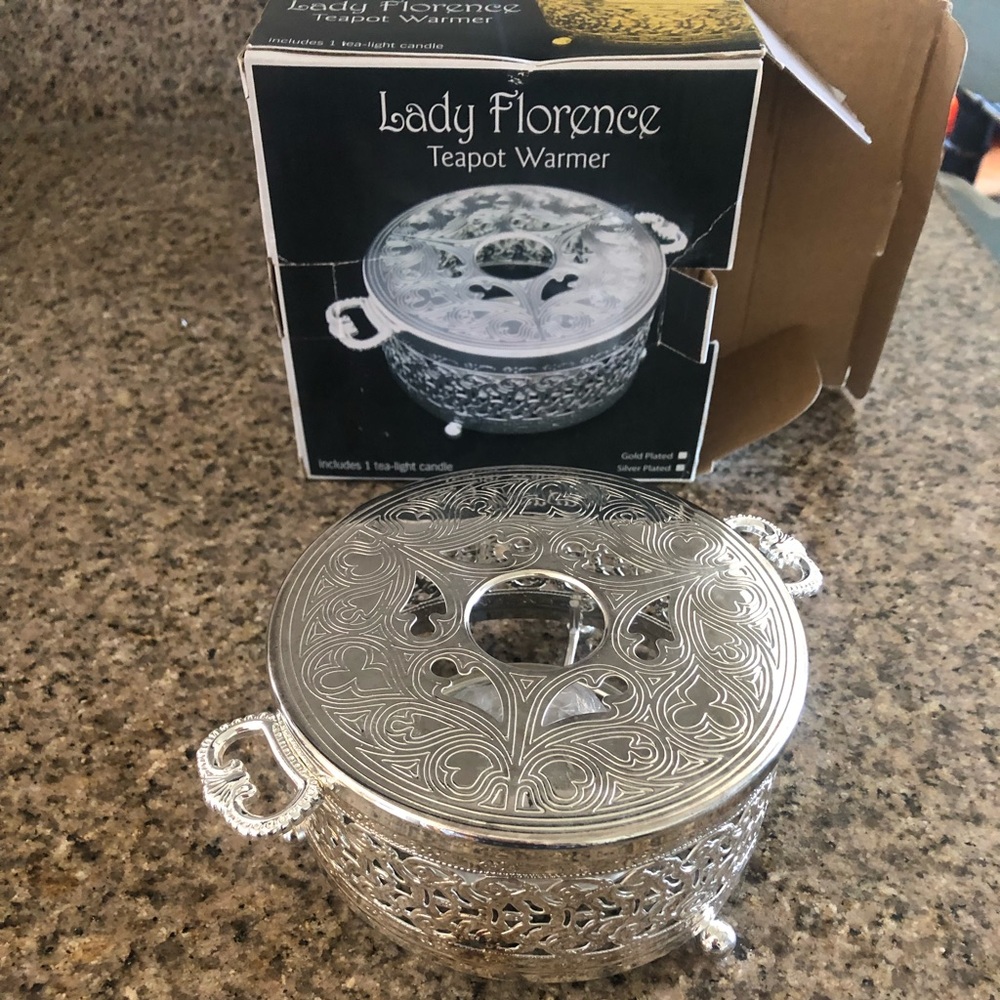 Beautiful brand new tea warmer..